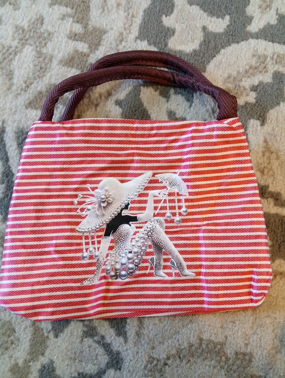 Red Striped Purse with Decorative Silhouette